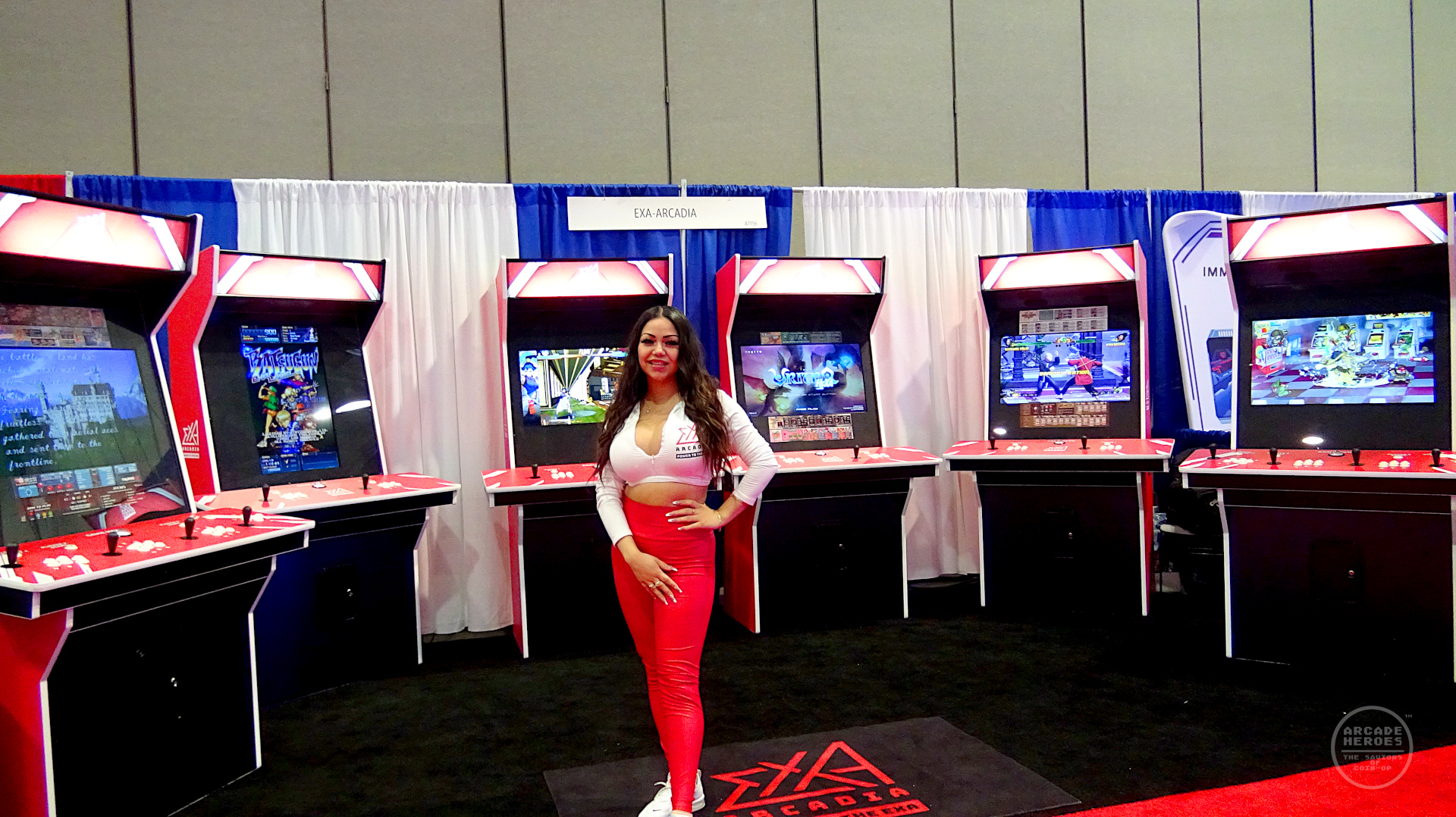 exA-Arcadia booth with woman, Amusement Expo 2023
