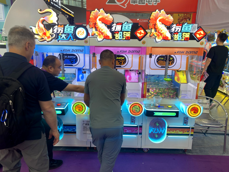 More crane machines featuring live goldfish as prizes at AAA 2024.