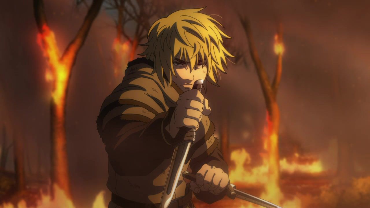 Thorfinn wielding two daggers in a burning forest in Vinland Saga