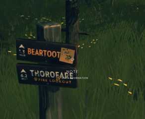 A sticky note on a sign in Firewatch. The note says 1964