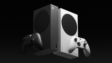 Two crisply styled Xbox Series S consoles, one white, one black, against a black background.
