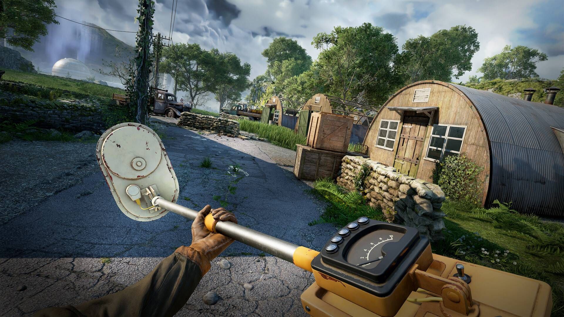 The player holding a metal detector in Atomfall.
