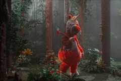 A bloody and bandaged mascot univorn holds and axe, still from Buddy movie