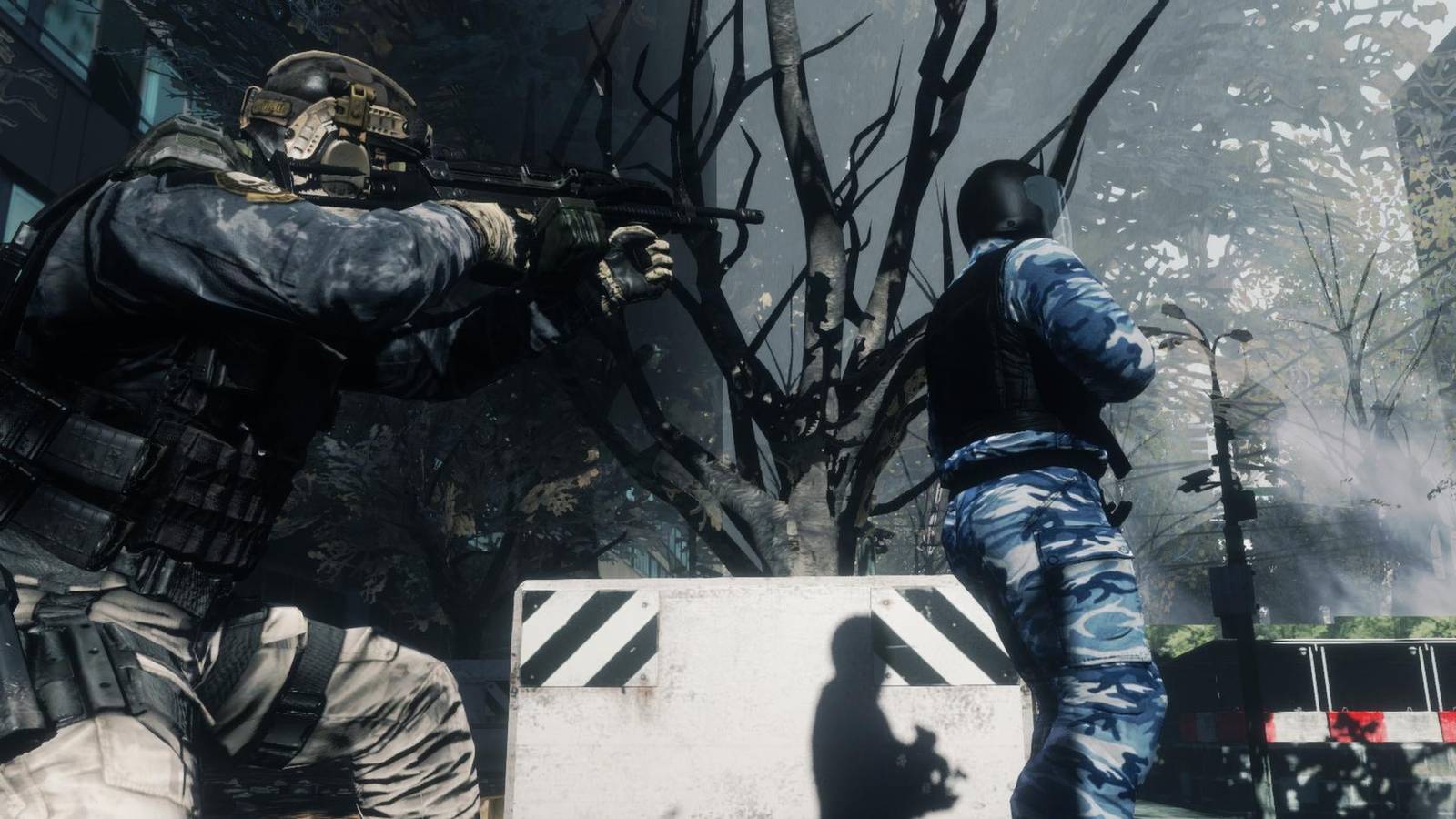 A soldier sneaks up on an enemy in Ghost Recon: Future Soldier