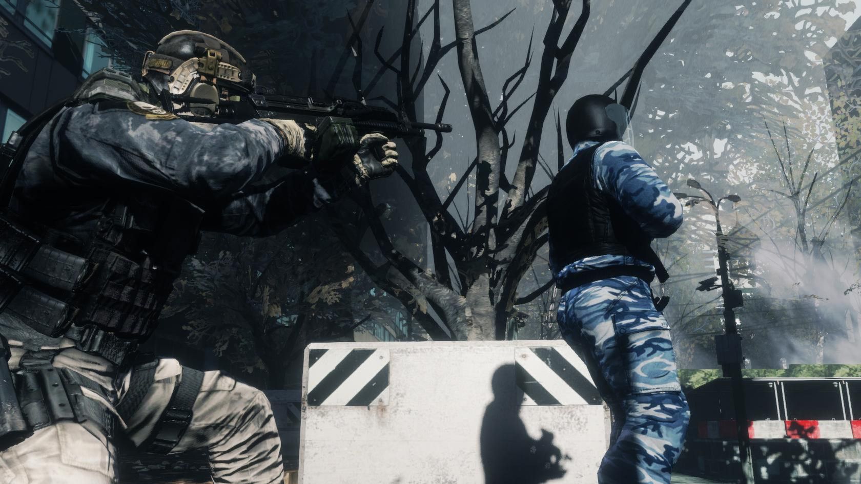 A soldier sneaks up on an enemy in Ghost Recon: Future Soldier