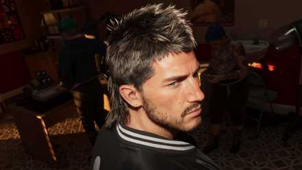 Jason Duval in GTA 6 with a short, styled haircut and a black jacket with a white and black collar