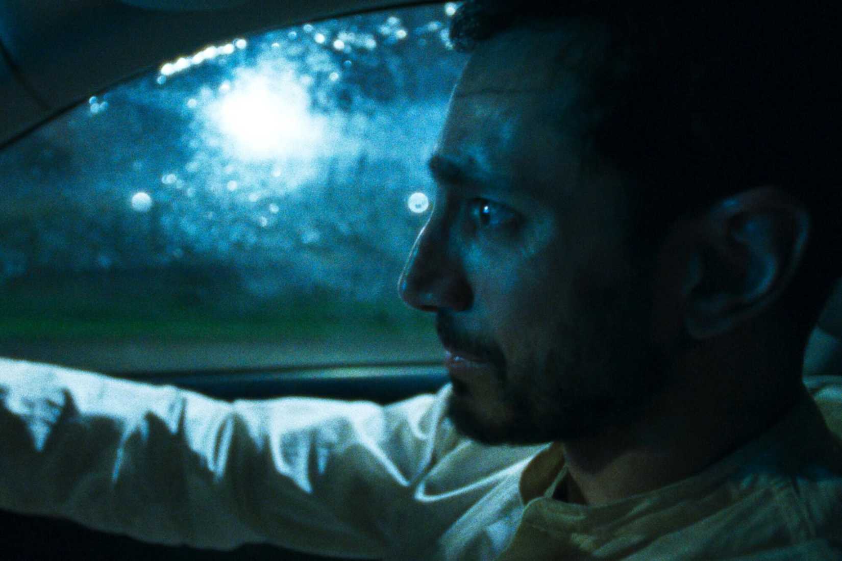 Riz Ahmed driving in Hamlet