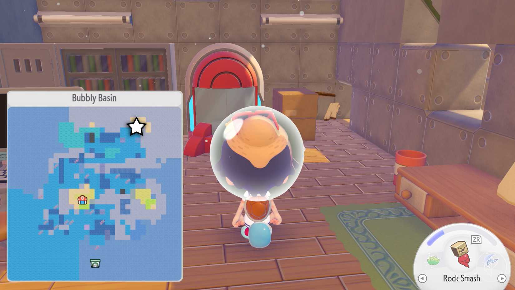 A Ditto character faces a portal pod in a room in Pokopia