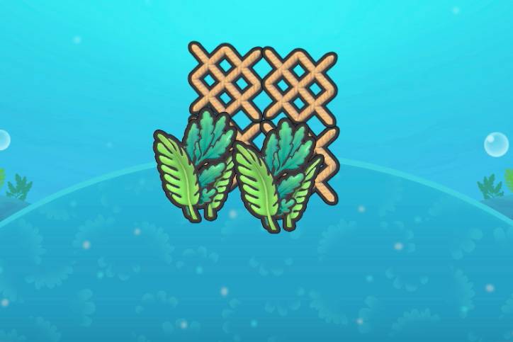 Seaweed growing in front of a brown netting that creates a fence-like structure