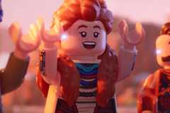 Lego-ized Aloy raising her arms in Lego Horizon Adventures
