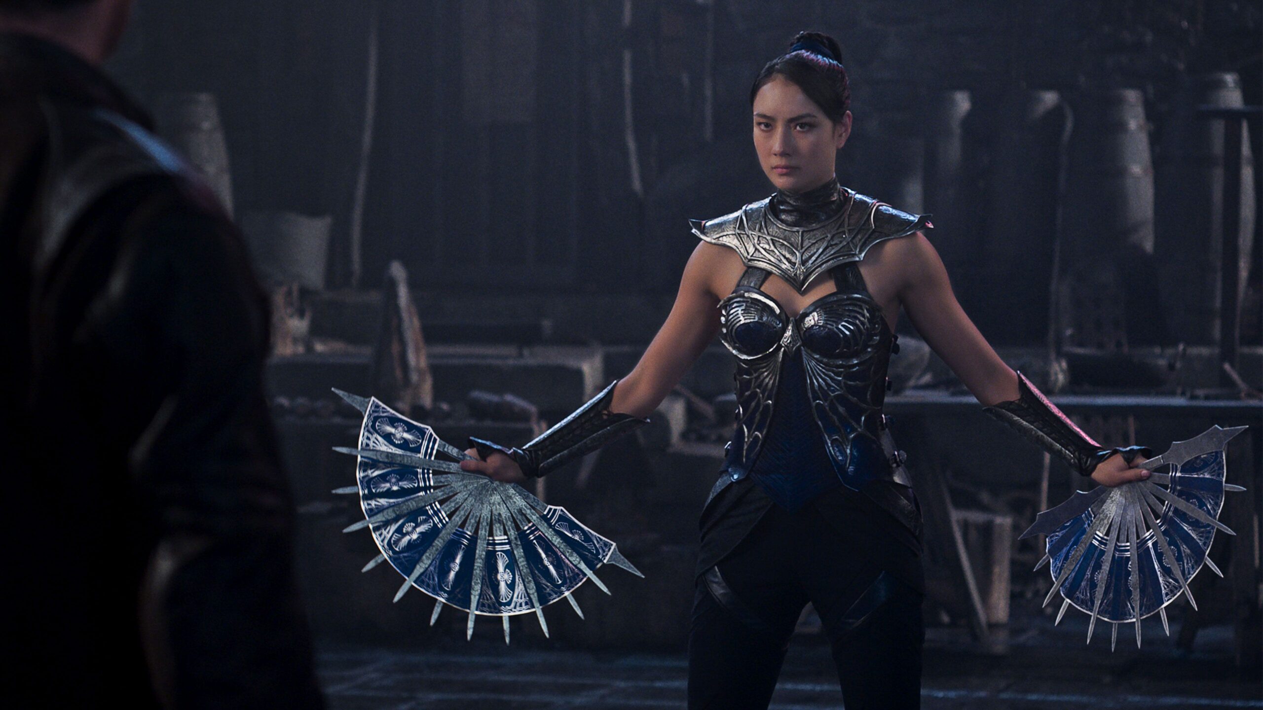 Kitana (Adeline Rudolph) displays her fan weapons in Mortal Kombat 2