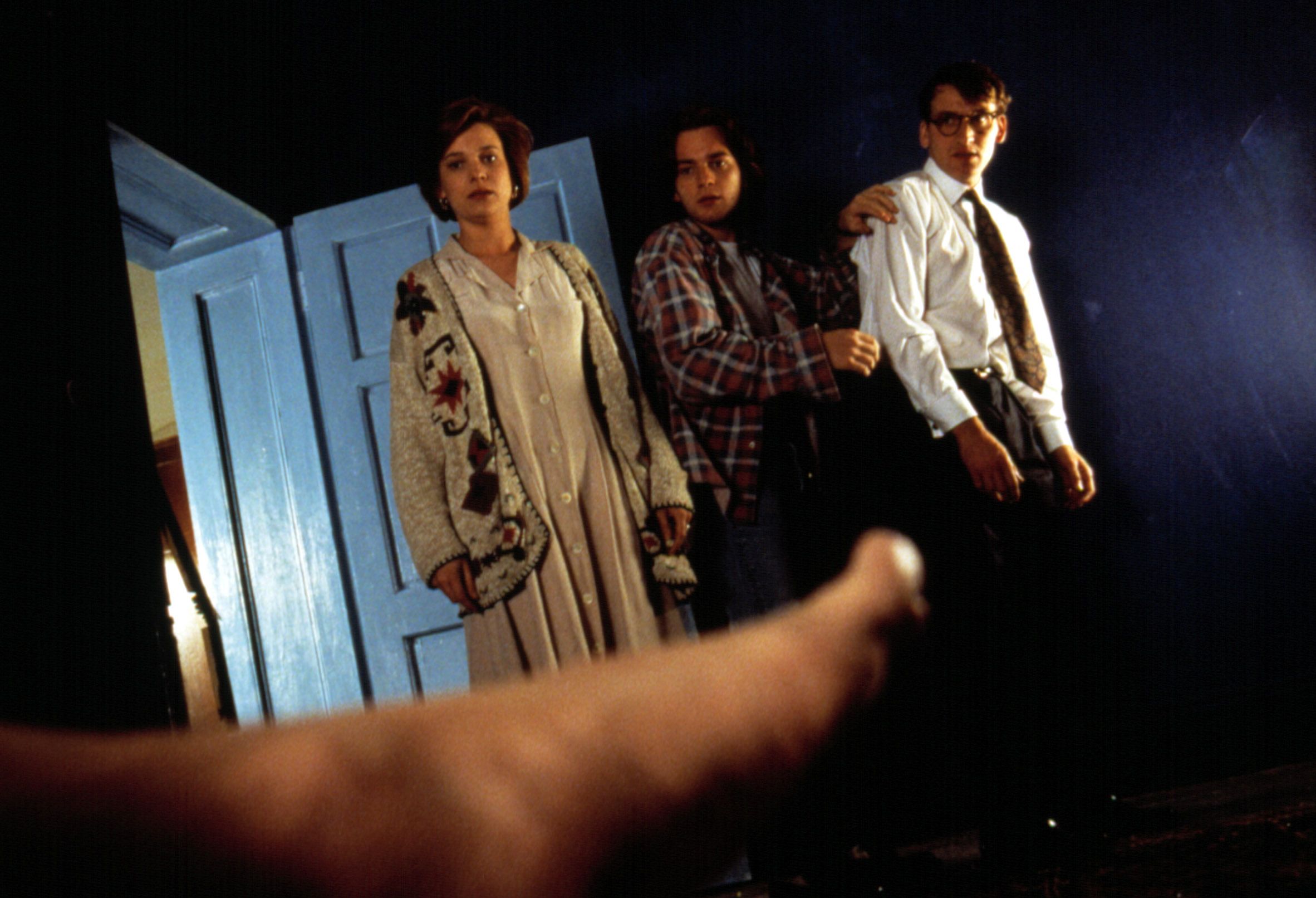 Kerry Fox, Ewan McGregor, and Christopher Eccleston look alarmed at a naked food