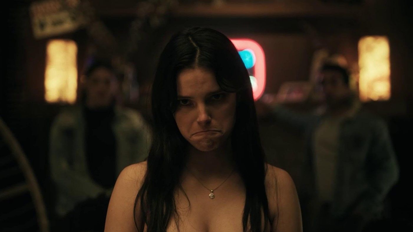 Nikki giving an eerie pout in Obsession.