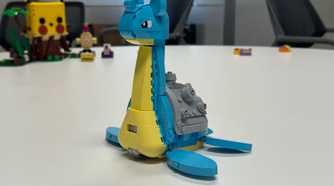 A Lego Lapras sits on a table.