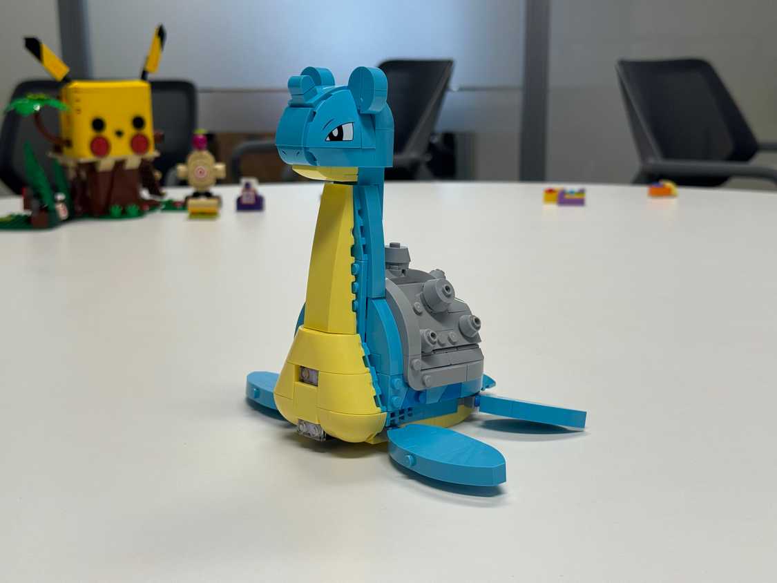 A Lego Lapras sits on a table.