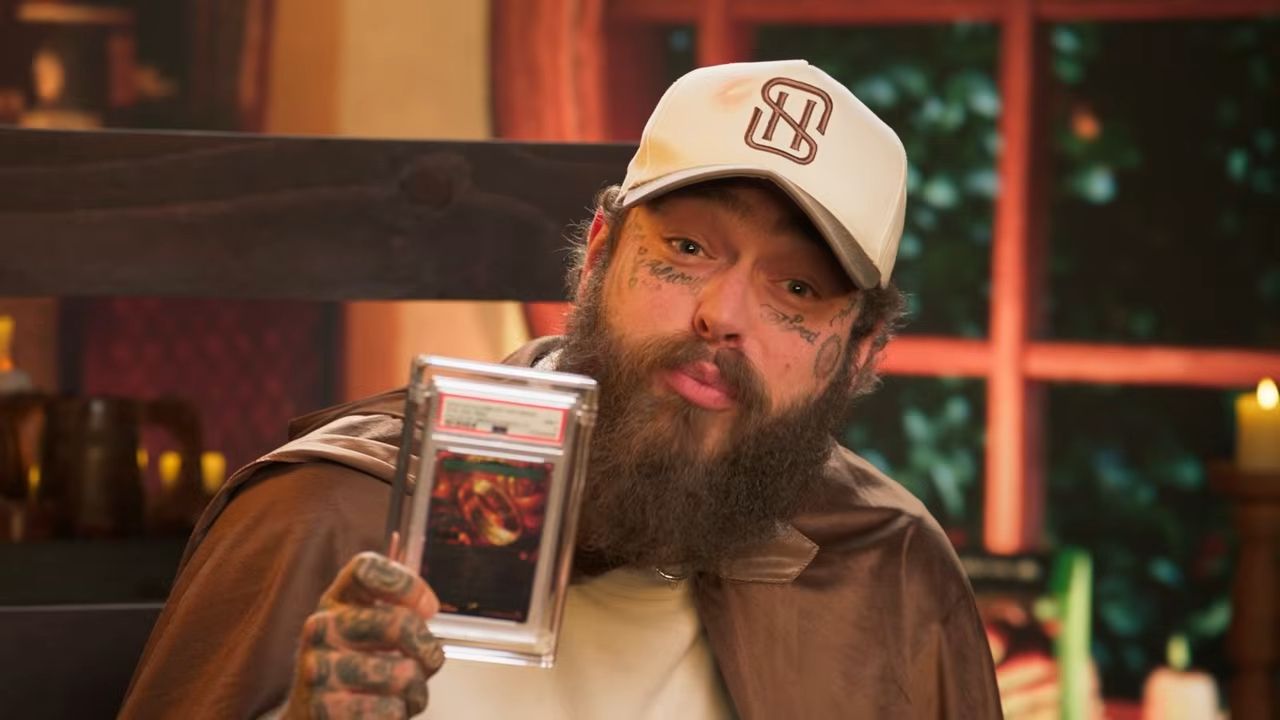 Post Malone showing off his rare One Ring Magic: The Gathering card.