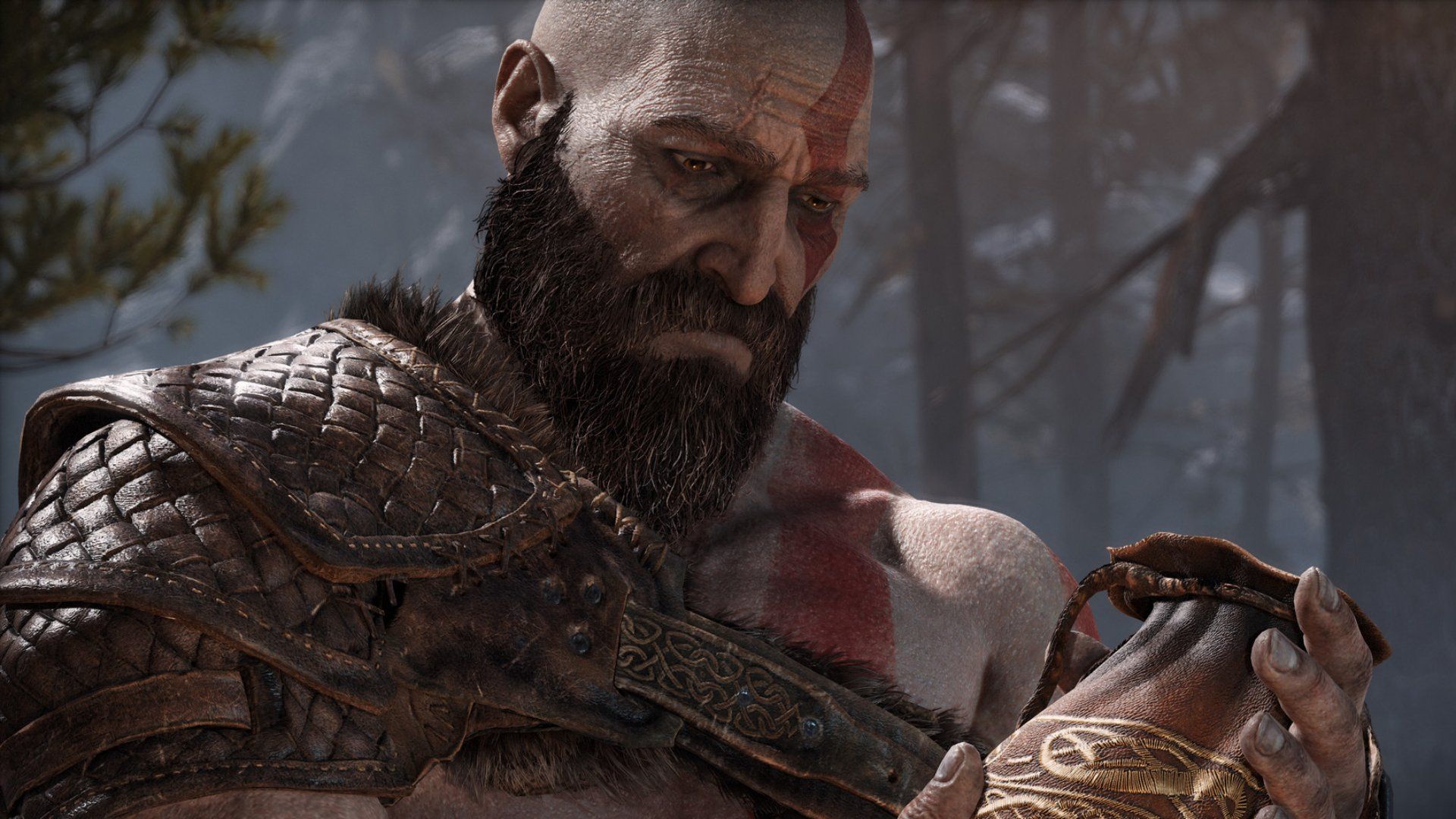Kratos stares at an urn in God of War