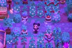 A player character in their garden in Moonlight Peaks