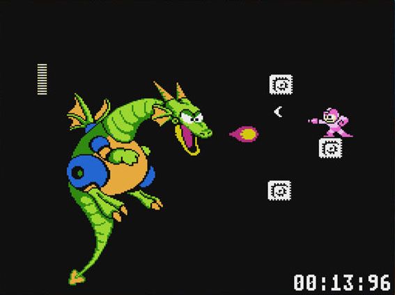 Mega Man jumps between blocks while fighting a dragon at the end of the first stage in Dr. Wily's Castle