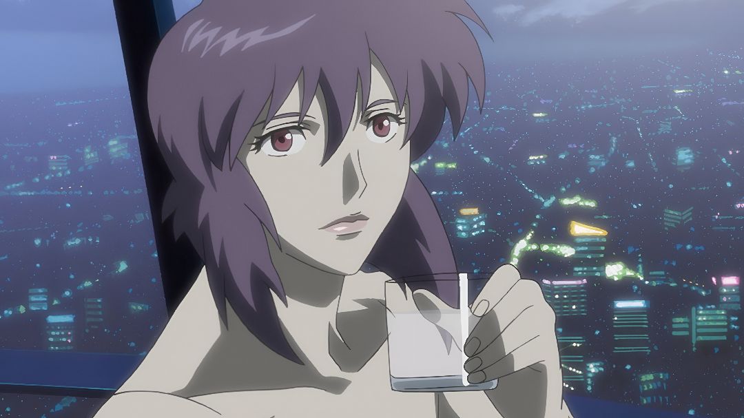 Motoko looks calm as she sips on a drink in Ghost in the Shell: Stand Alone Complex
