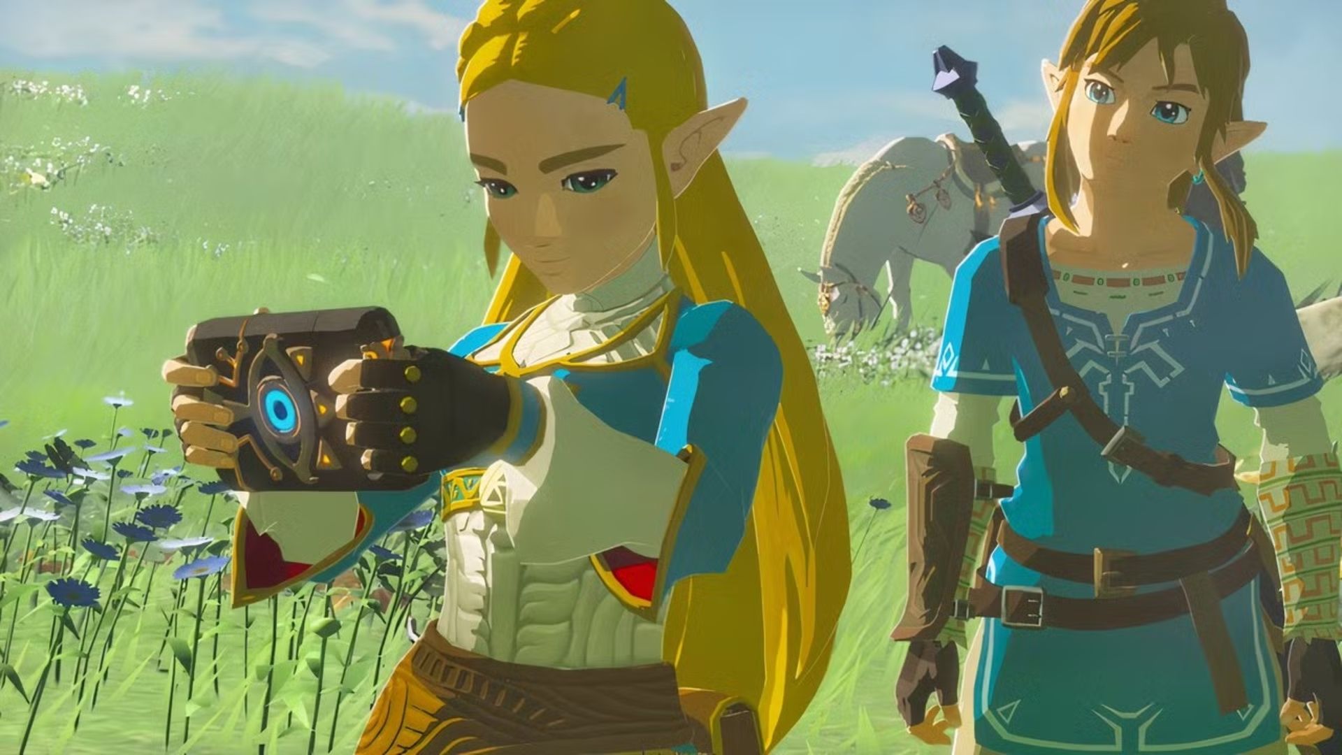 Zelda holding the Sheikah Slate.