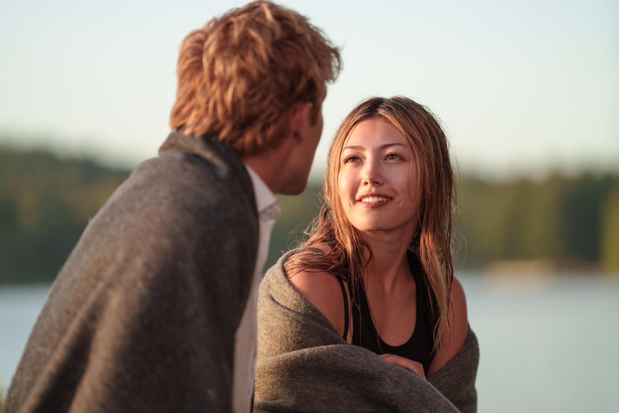 A young woman and a young man in Crew Girl