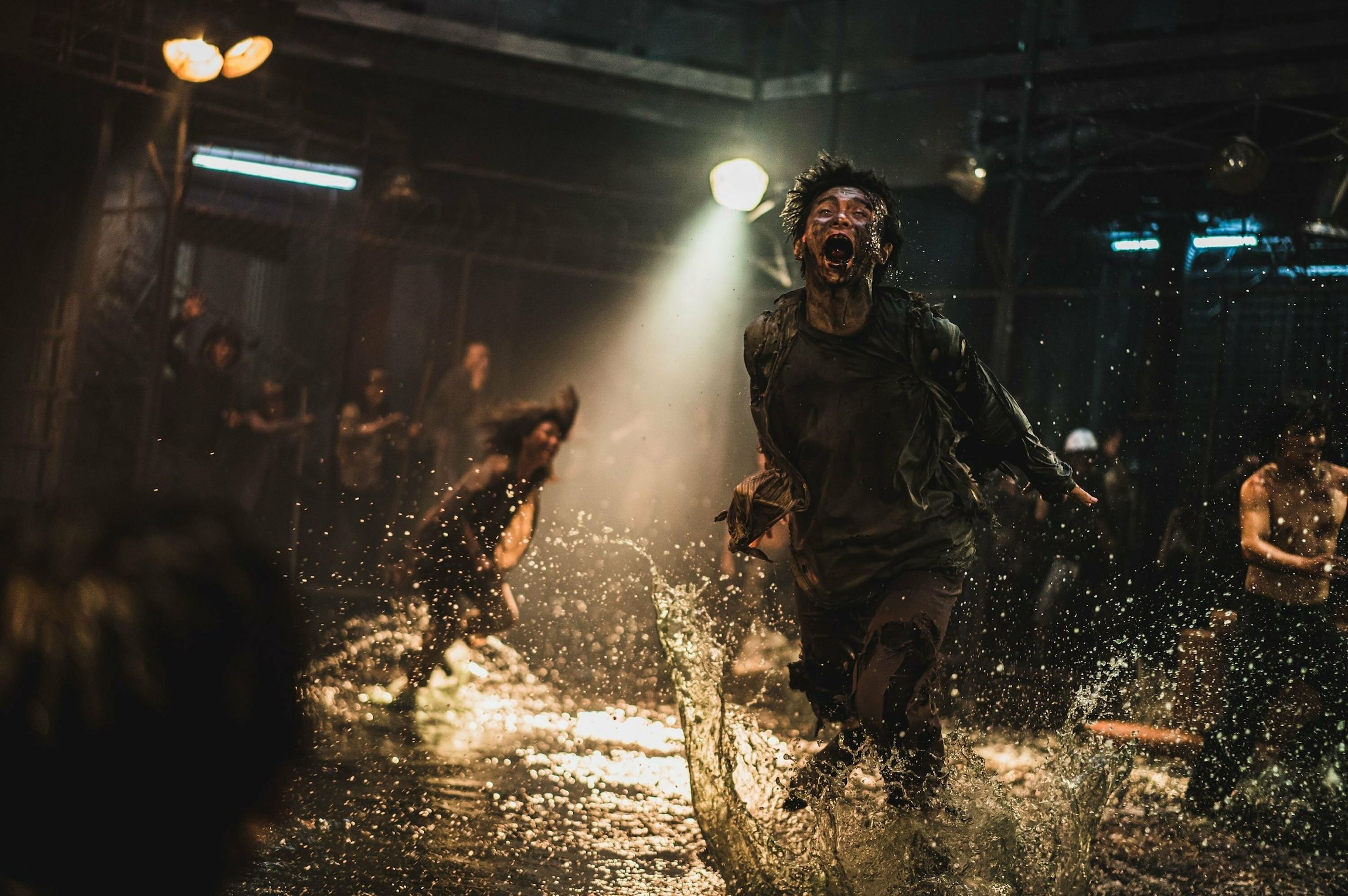 a zombie chases rebels in Train to Busan Presents Peninsula