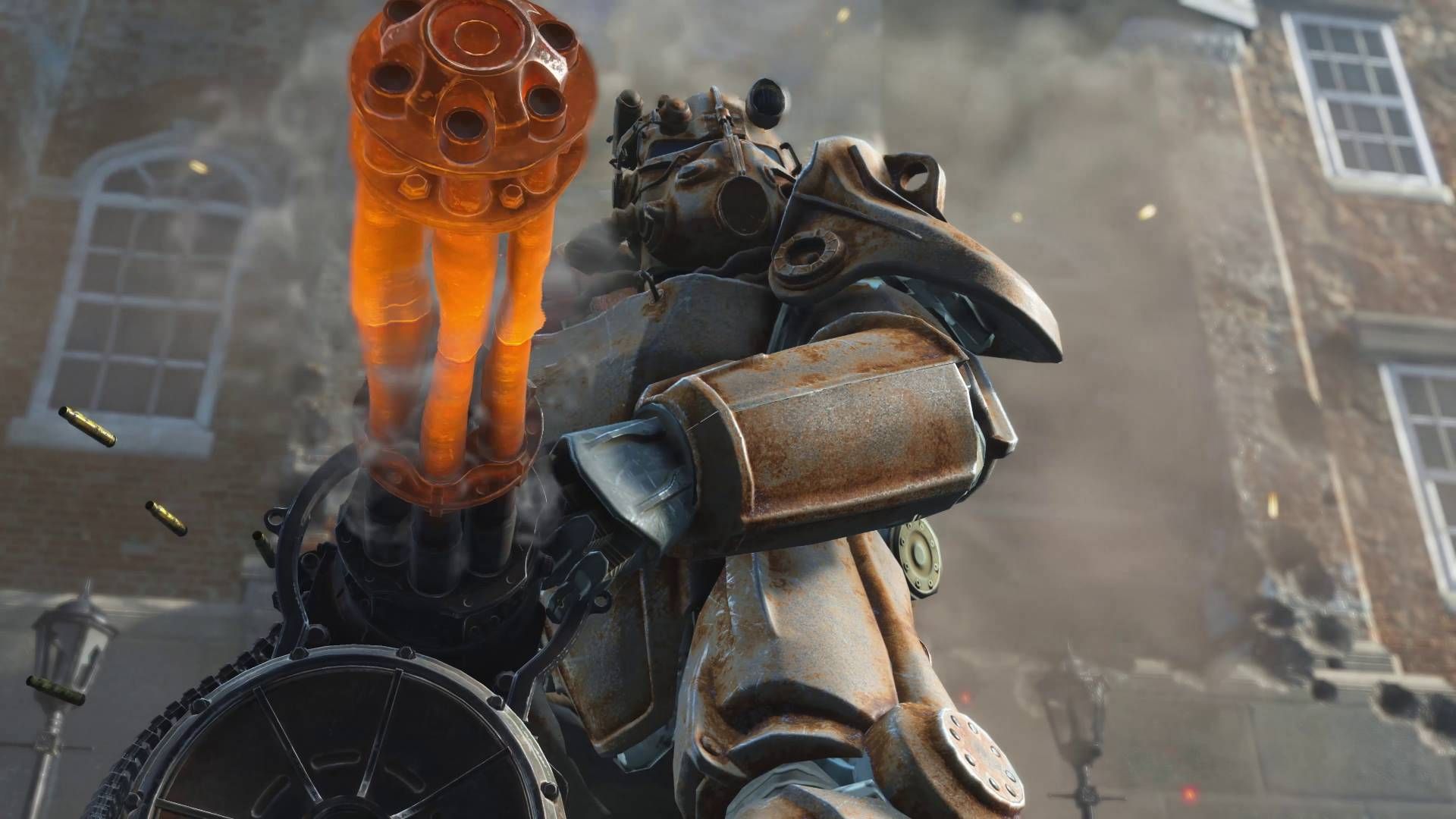 Someone wearing a suit of power armor and wielding a minigun in Fallout 4.