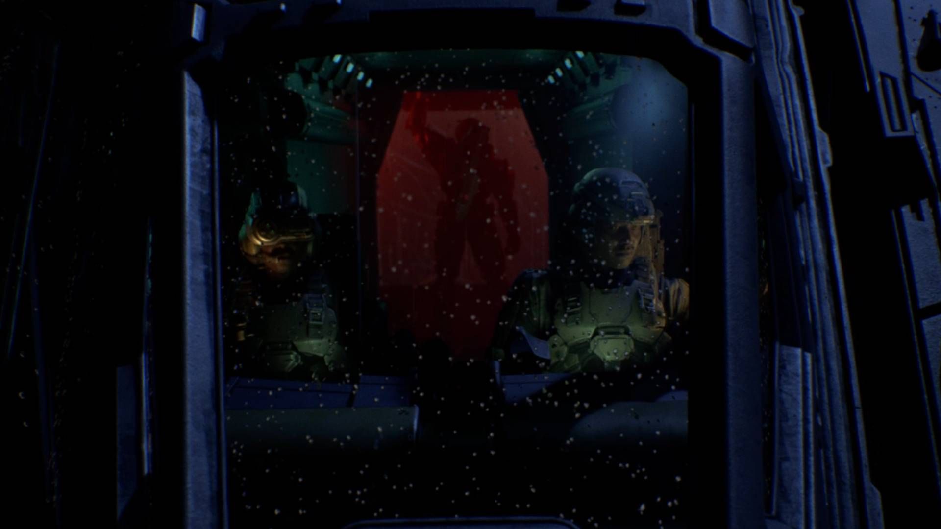 The silhouette of Master Chief on the pelican behind the pilots.