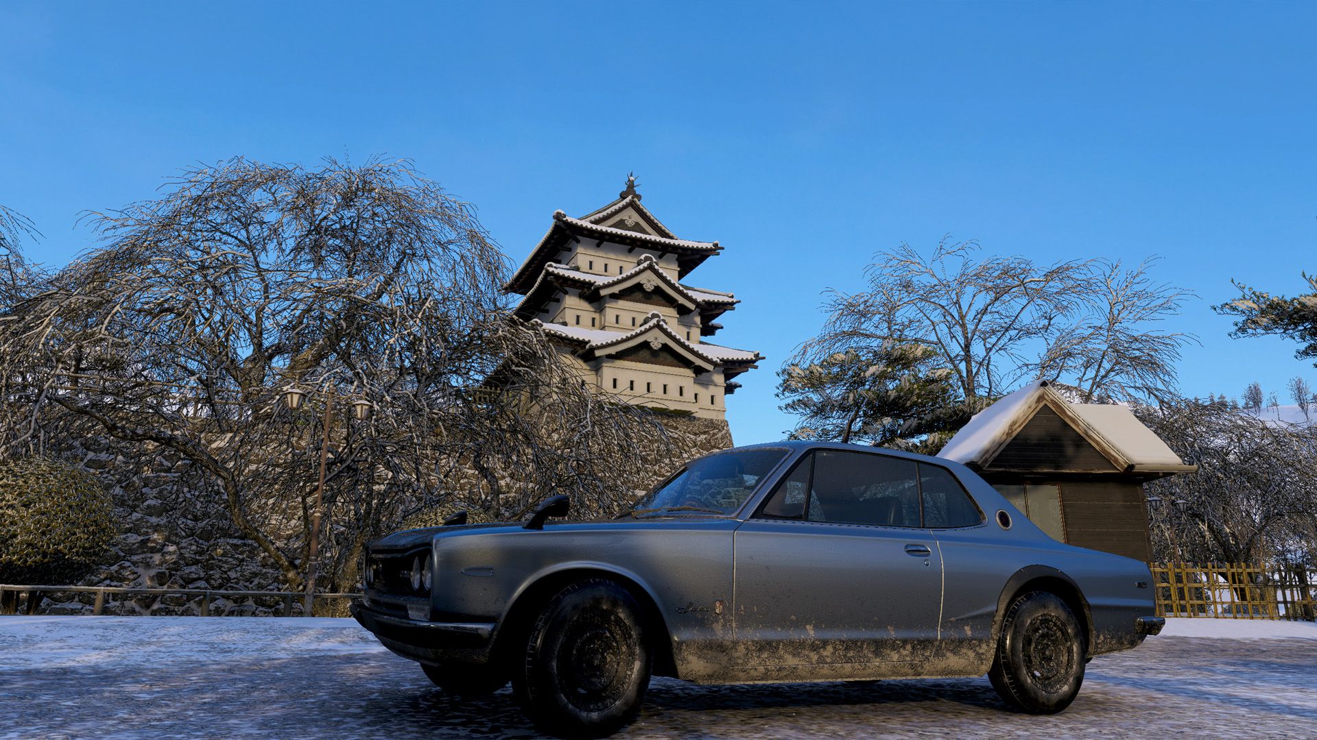 A car sitting in front of a Japanese castle in the winter time in Forza Horizon 6.