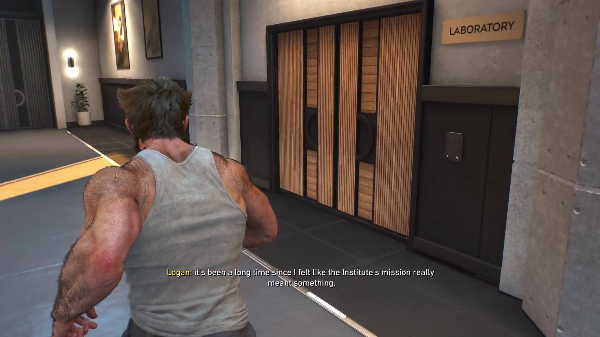 Logan by the entrance to Walter's lab in Marvel's Wolverine.