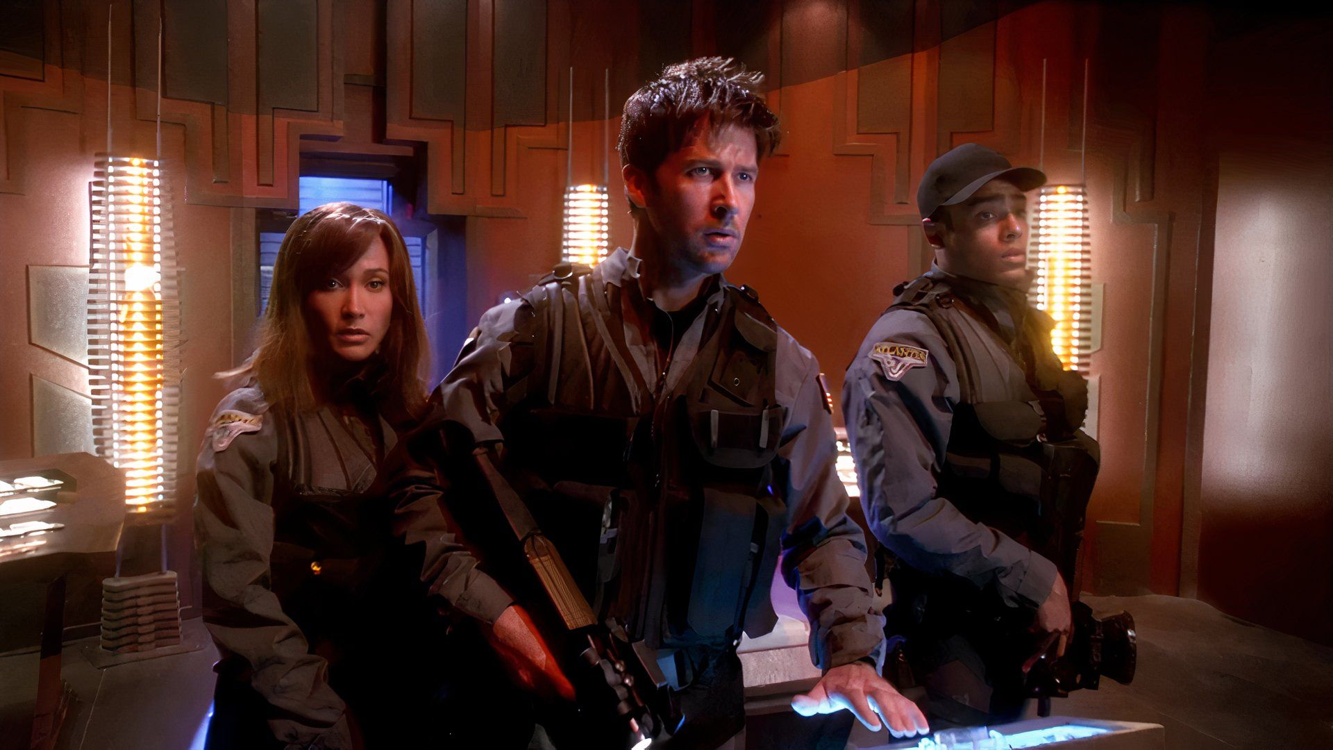 Sheppard and his crew try to navigate a console in Stargate Atlantis
