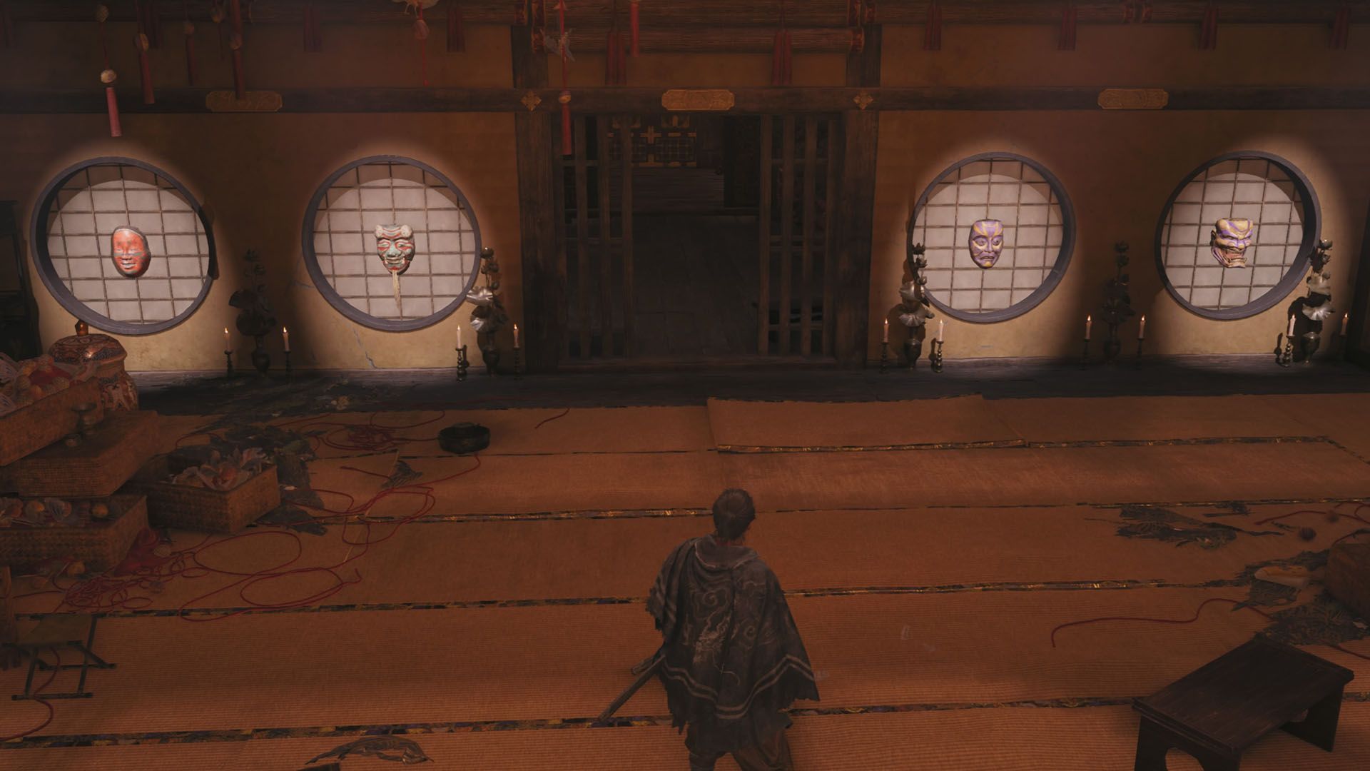A Onimusha: Way of the Sword screenshot showing four kabuki-like masks on one window each
