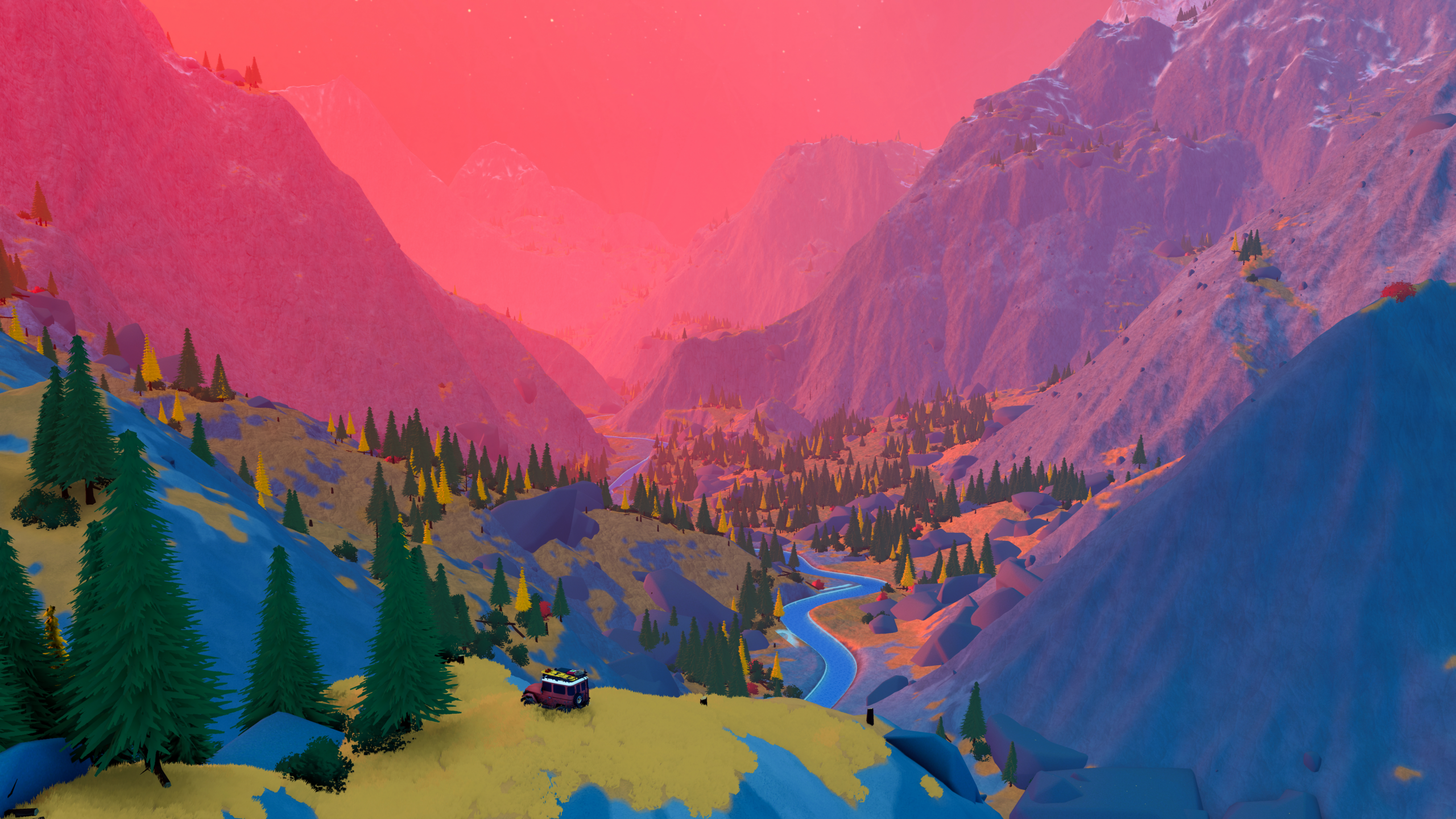 a 4x4, tiny in the foreground, surveys an alpine valley at sunset