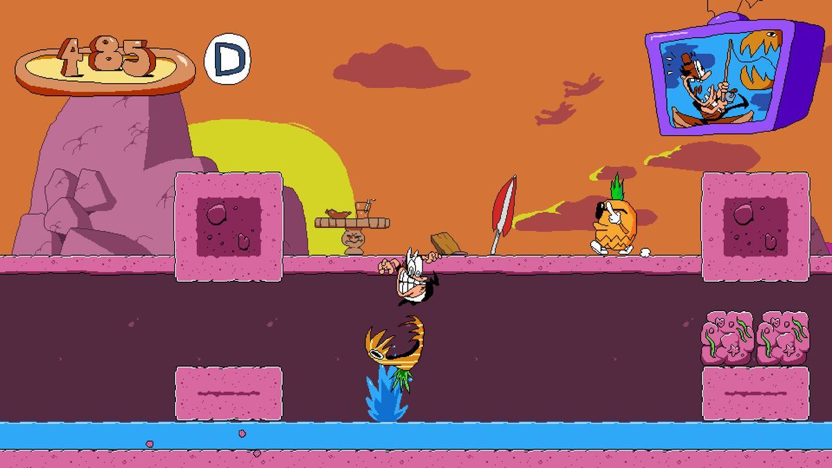 The protagonist of Pizza Tower jumps up onto a higher platform to confront what looks like a pineapple throwing up the bird