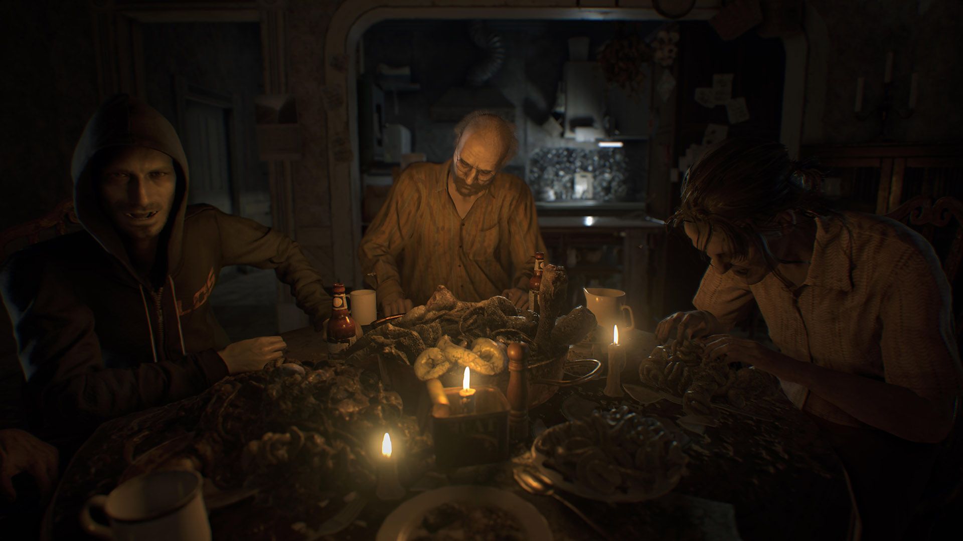 In this Resident Evil 7 screenshot, the player character is at a table. Seated around him are members of the evil family that has kidnapped him, including Jack, Marguerite and Lucas. The table in front of them is full of disgusting looking food in the for