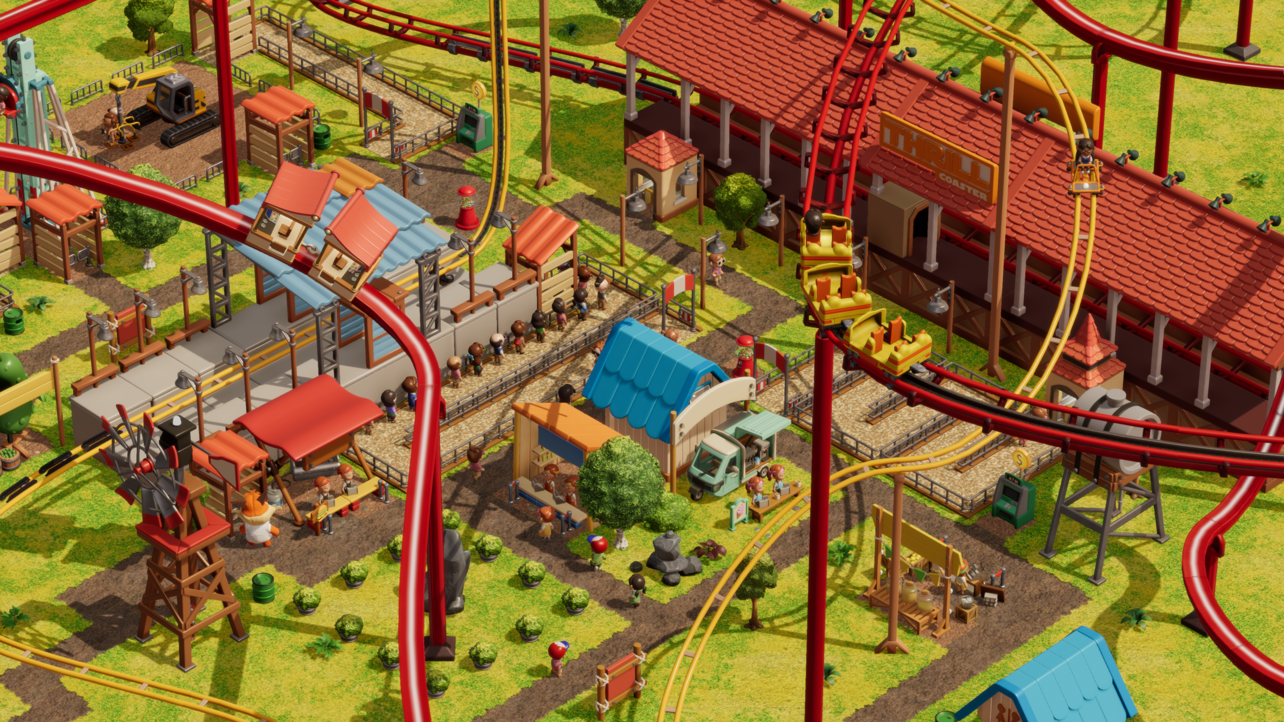 A rollercoaster snakes around a park in Rollercoaster Tycoon Wonderworks.