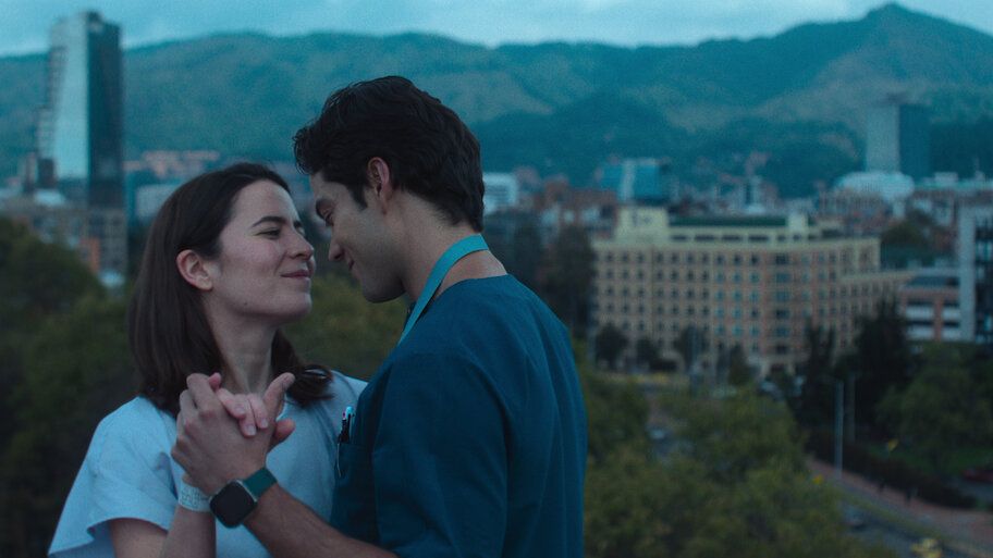 Two people dancing on a rooftop in Stolen Heartbeats