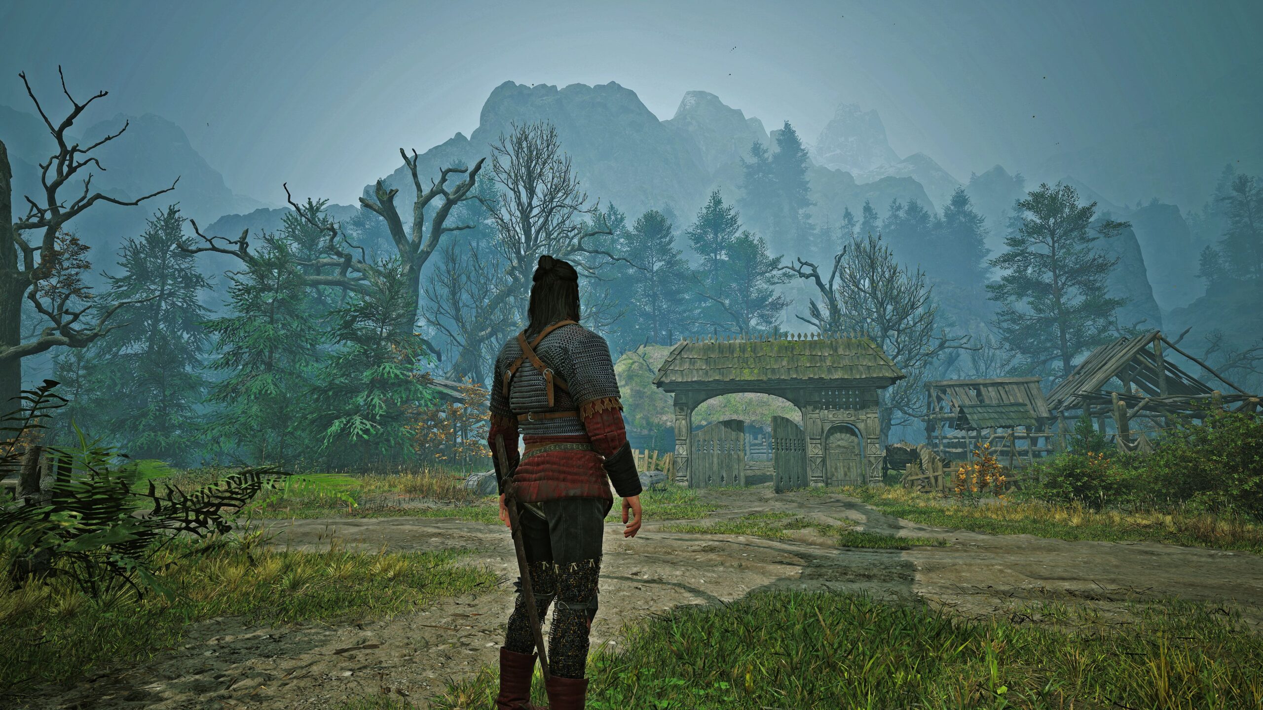 Coen looks at an old inn in The Blood of Dawnwalker.