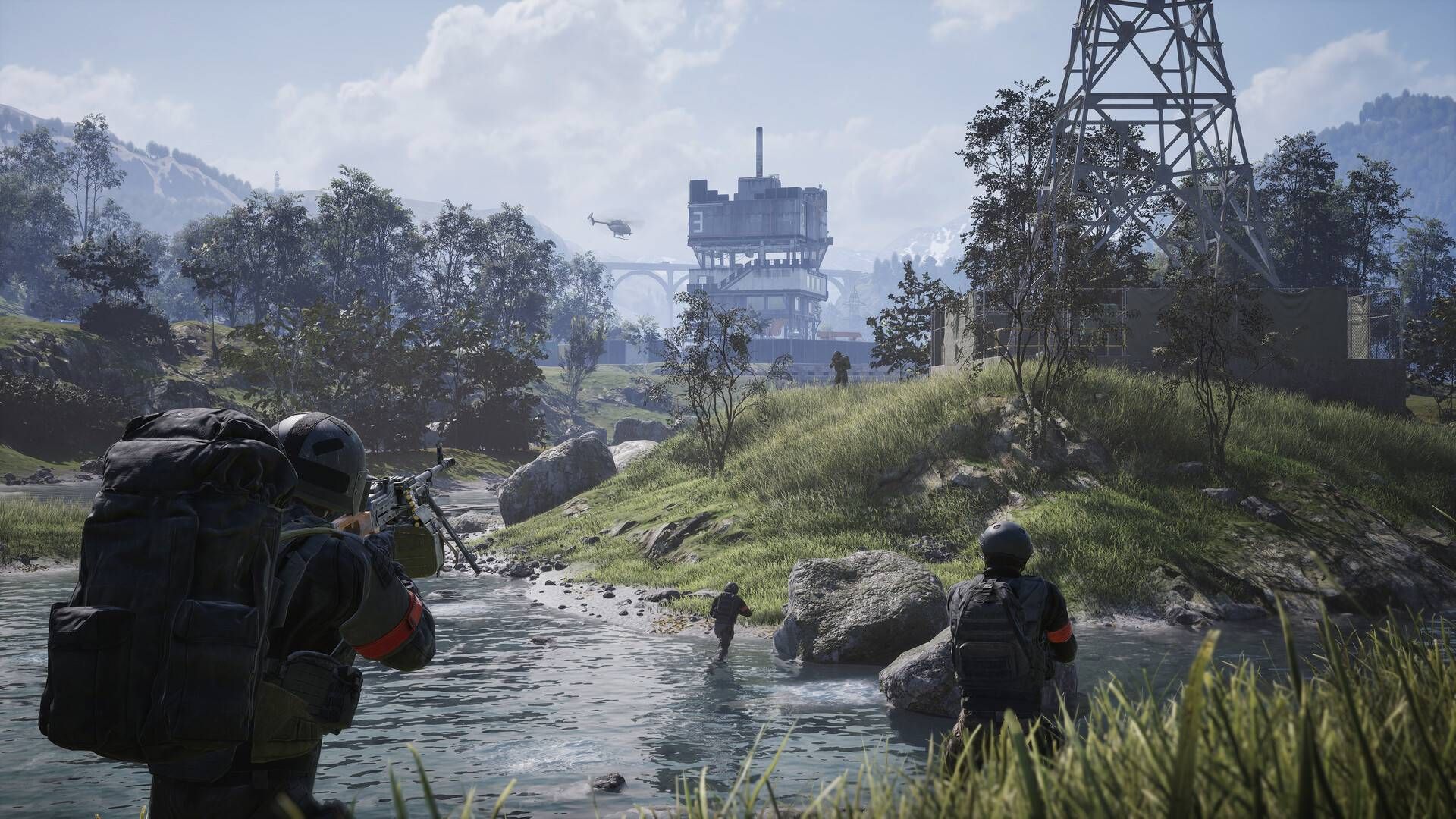 Three soldiers in Wardogs aiming across the map next to a creek.