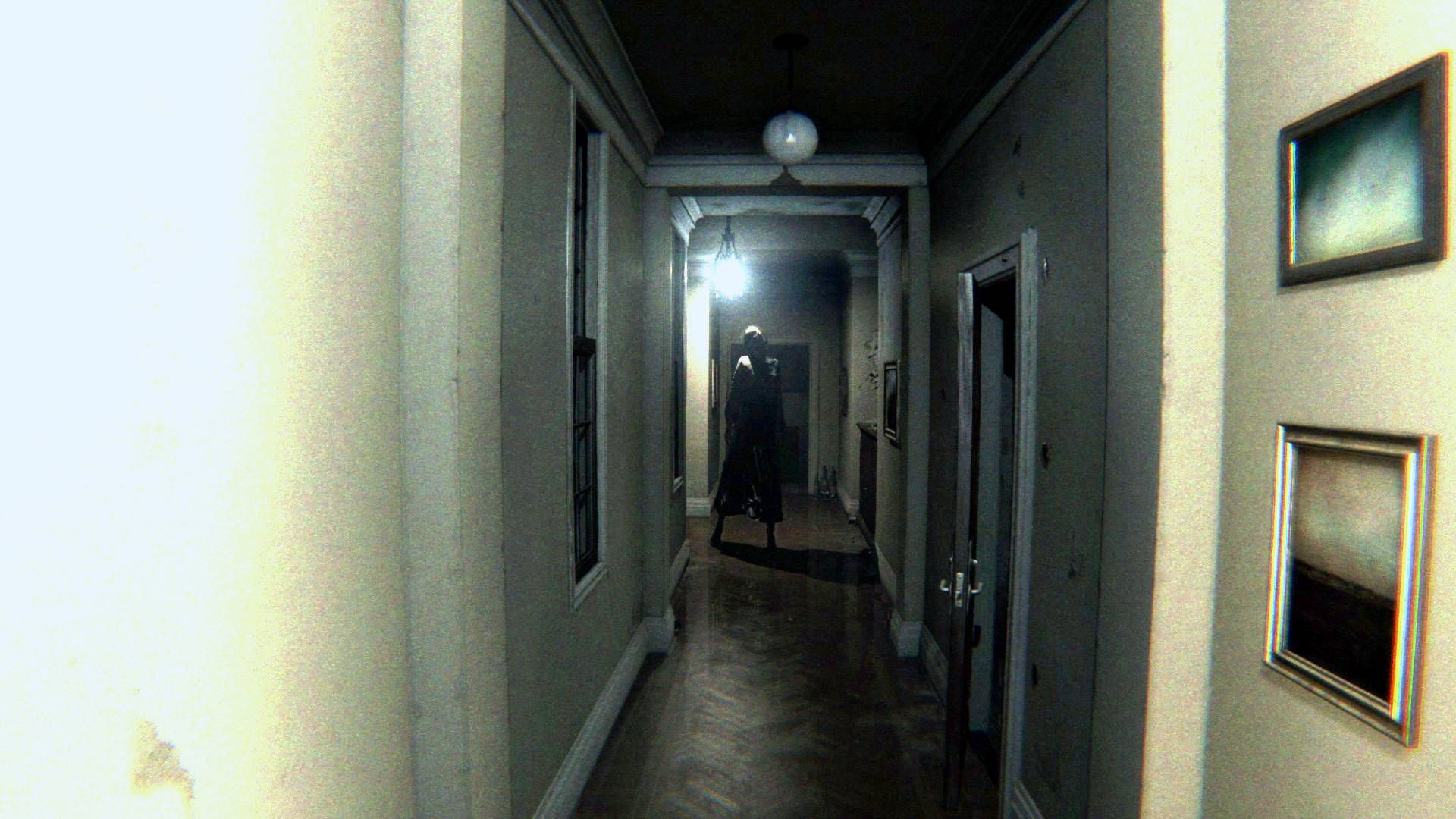 Scary P.T. character Lisa down a dark hallway