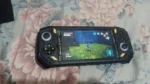RG52 Mini Handheld Game Console – 22,000+ Retro Games, 5.5" IPS HD Screen, RK3562 Dual System photo review