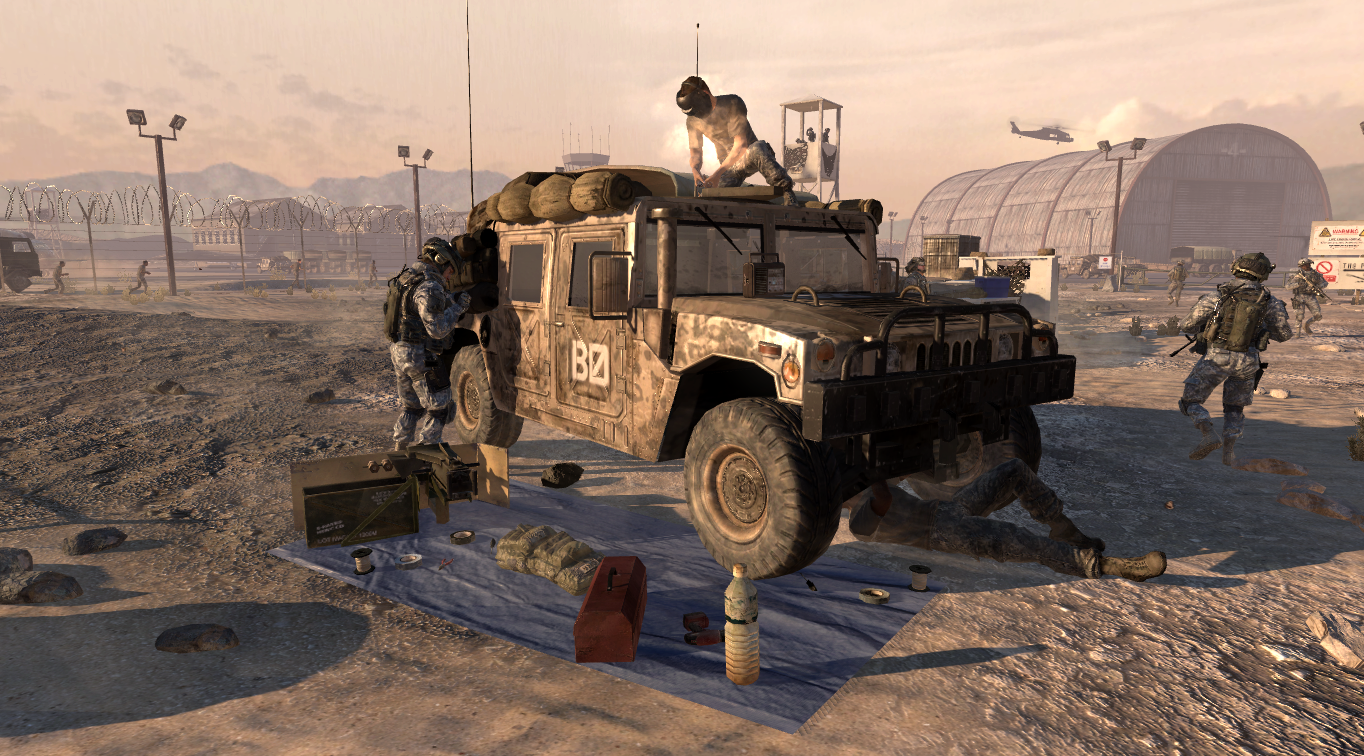 soldiers surround a humvee, working on repairs to it, in Call of Duty: Modern Warfare 2