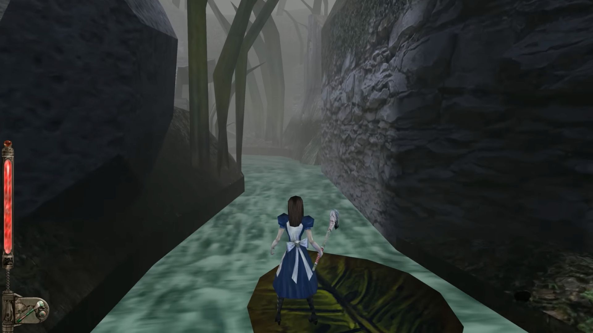 Alice shrinks down to float down a stream atop a leaf.