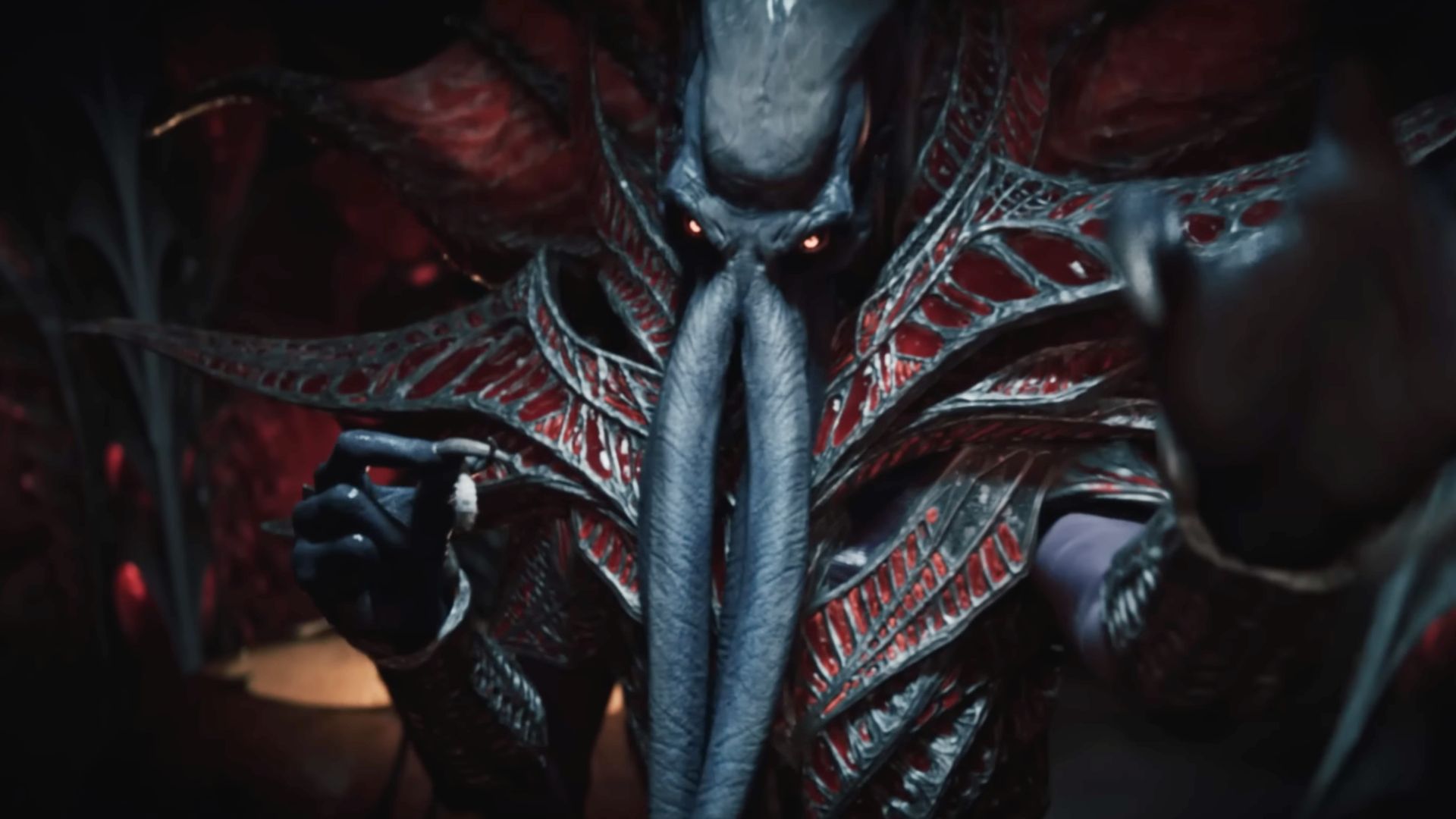 A close-up shot of a red-eyed, tentacle-faced Mindflayer, as seen in Baldur's Gate 3.