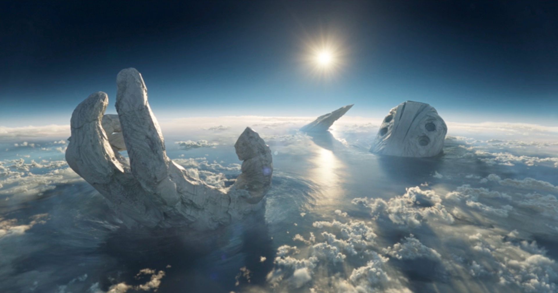 A still from Marvel’s Eternals, showing the rocky remains of the Celestial Tiamut resting in the Indian Ocean