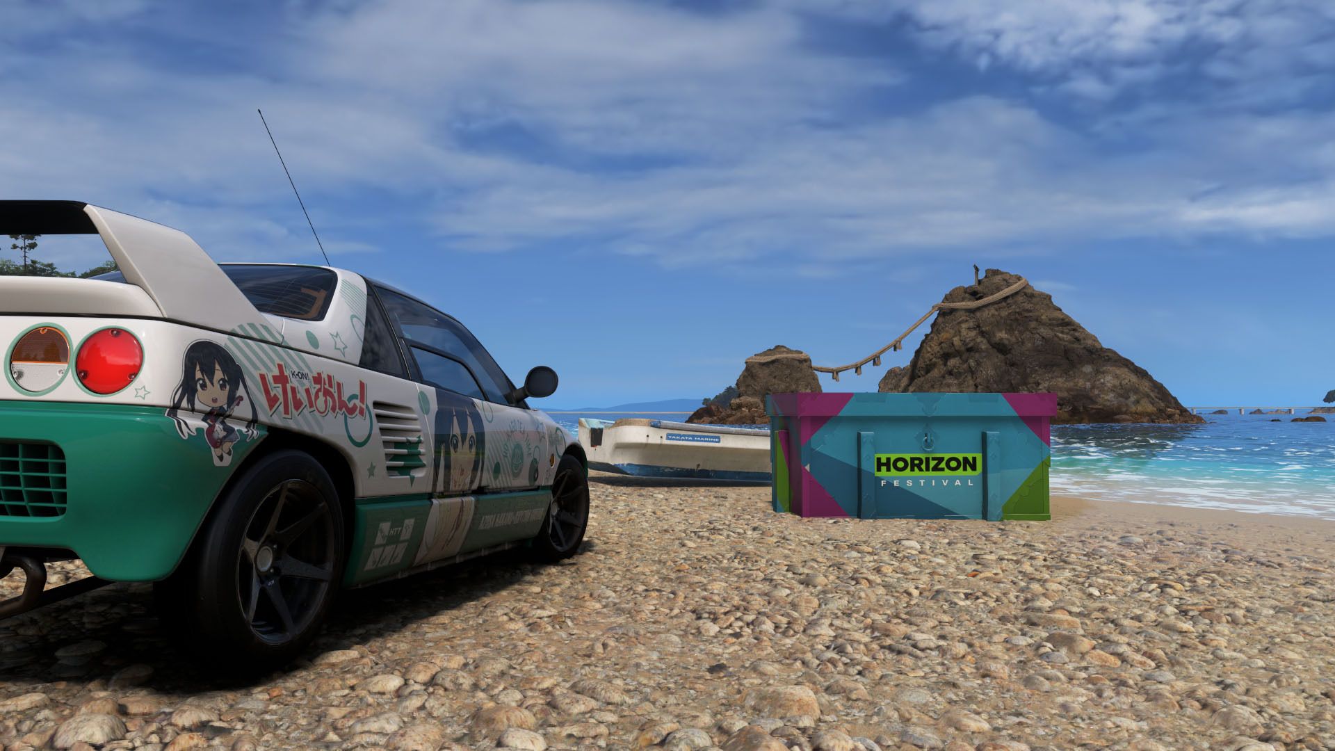 A car and a box in front of Meoto Iwa in Forza Horizon 6.
