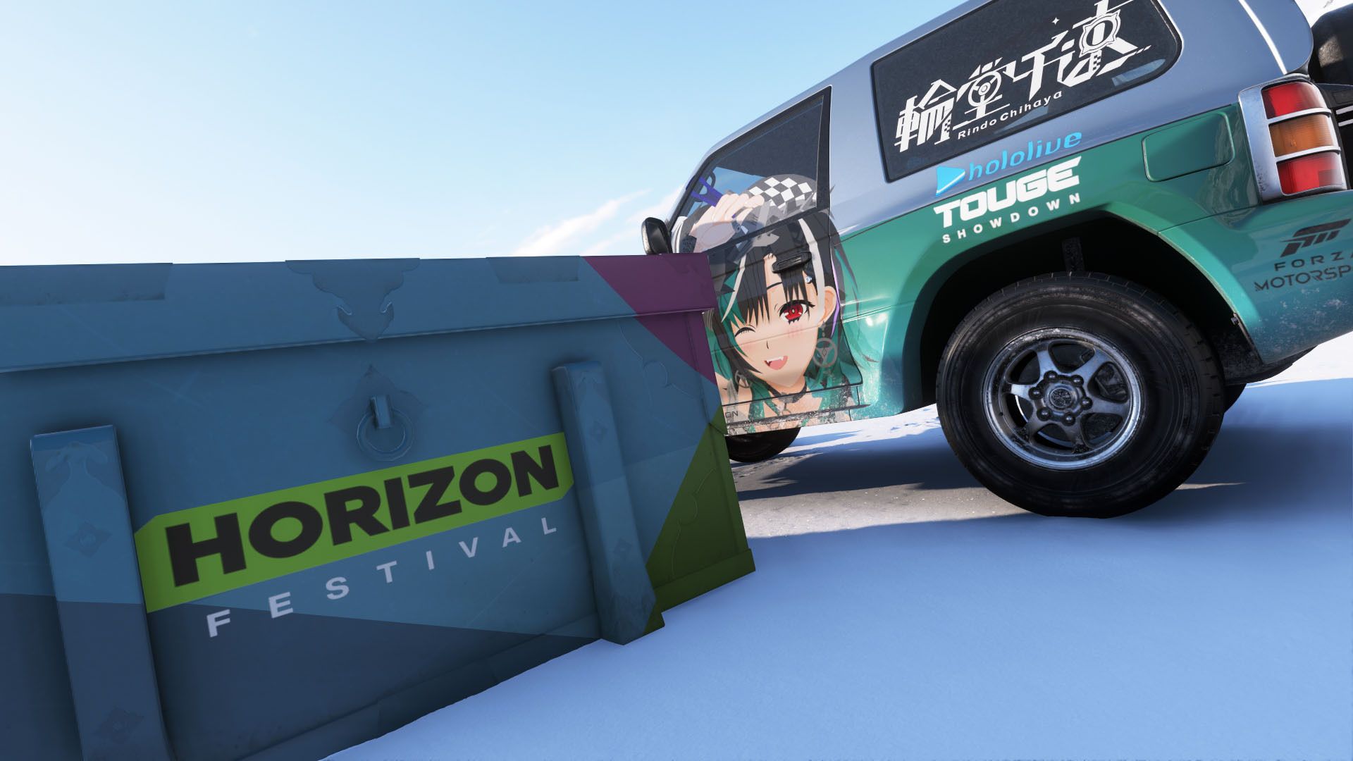 A car parked beside a Horizon Festival box in Forza Horizon 6.