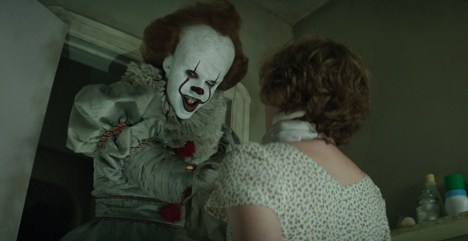 It: Chapter One - Pennywise with his hands around a woman’s throat