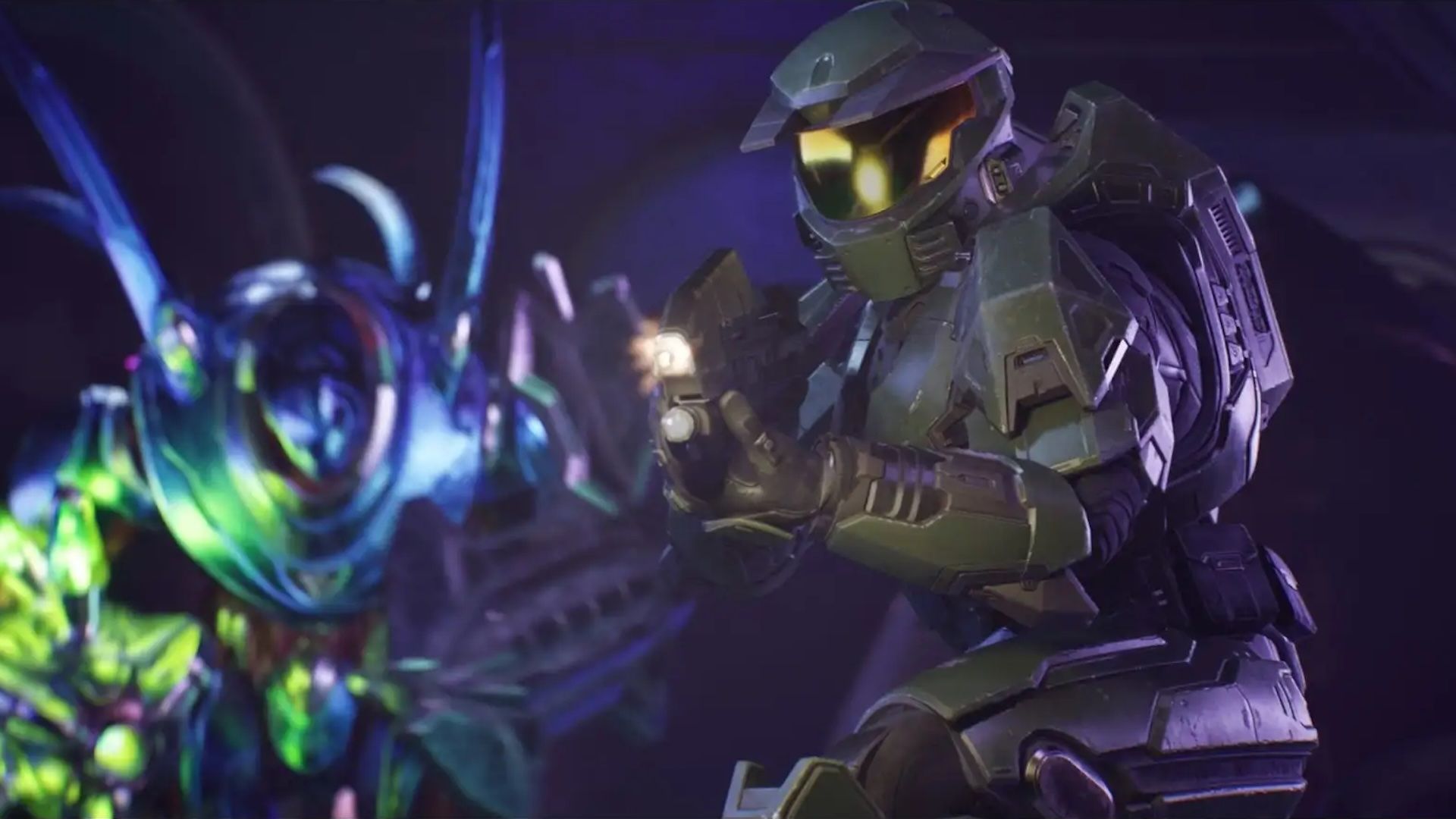 Master Chief is flanked by an enemy in a screenshot from Halo Campaign Evolved